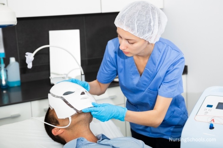 Dermatology Nurse administering a UV light facial treatment, using specialized skills to ensure patient safety and comfort.
