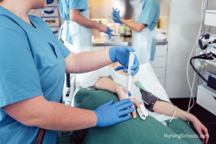 Gastroenterology Nurse giving anesthesia to a patient prior to an endoscopy examination.