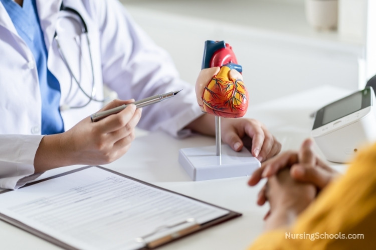 Genetics Nurse discussing her findings with a patient.