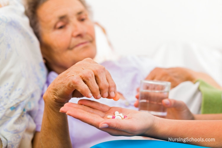Hospice Nurse administers medication to a patient.