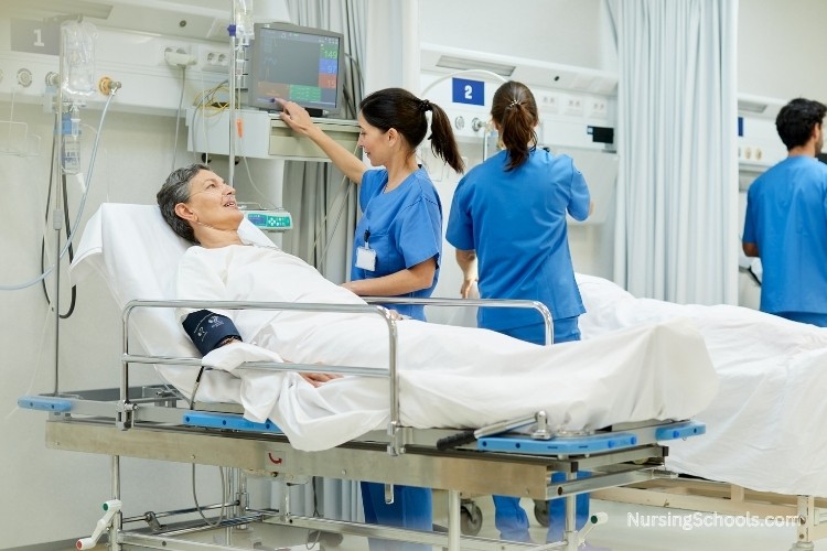 Two Medical-Surgical Nurses caring for post-operative patients in a recovery room, monitoring vital signs and checking for complications.