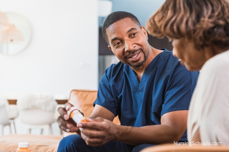 Mental Health Nurse explaining psychiatric medication to a patient during a one-on-one counseling session.
