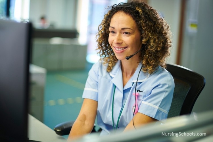 Nurse Advocate consults with other medical staff to discuss a patient's needs.