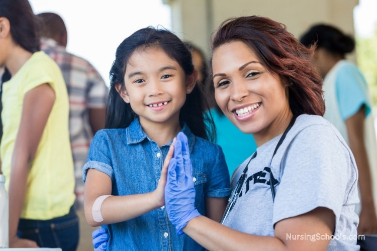 Parish Nurse administers vaccinations at the community church.