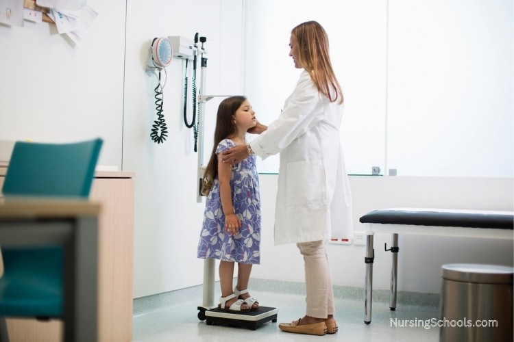 Pediatric Nurse Practitioner conducts a routine health screening for a young girl.