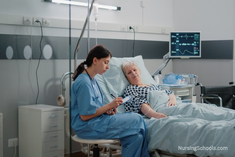 Pulmonary Care Nurse monitors oxygen levels and assesses the female patient lying in a hospital bed.