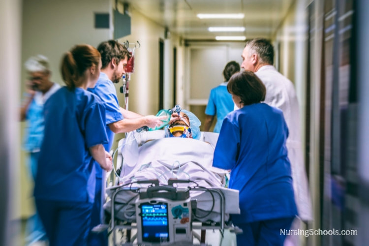 Trauma Nurse transporting a patient to the operating room.